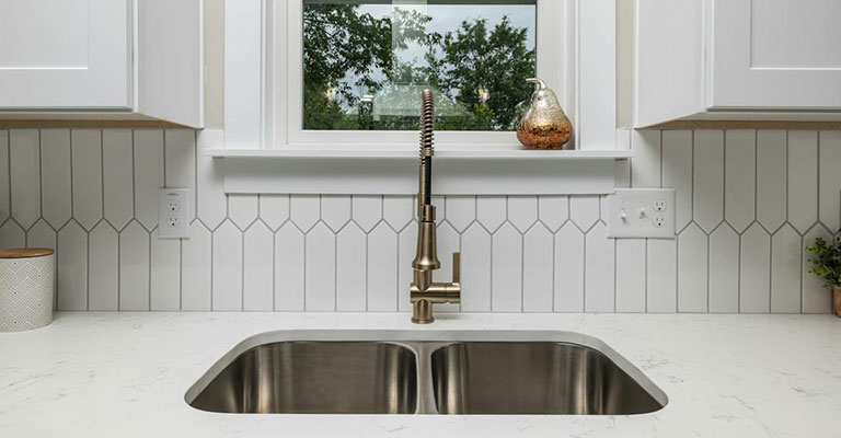 Practical Considerations for Placing the Kitchen Sink Under a Window